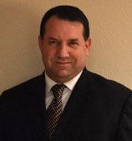 Dr. Charles Sarosy